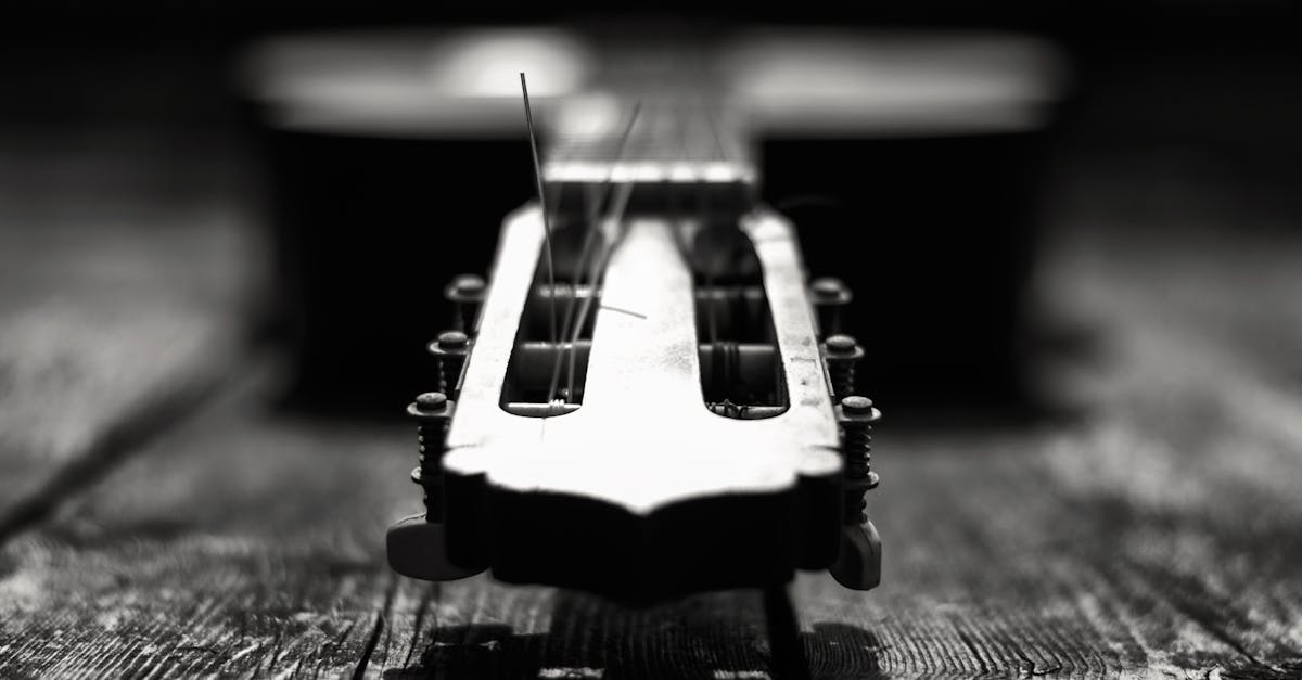 Grayscale Photography Of Guitar