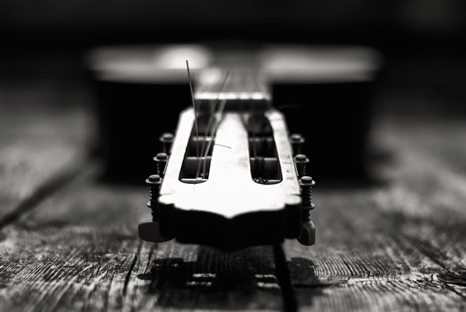 Grayscale Photography Of Guitar
