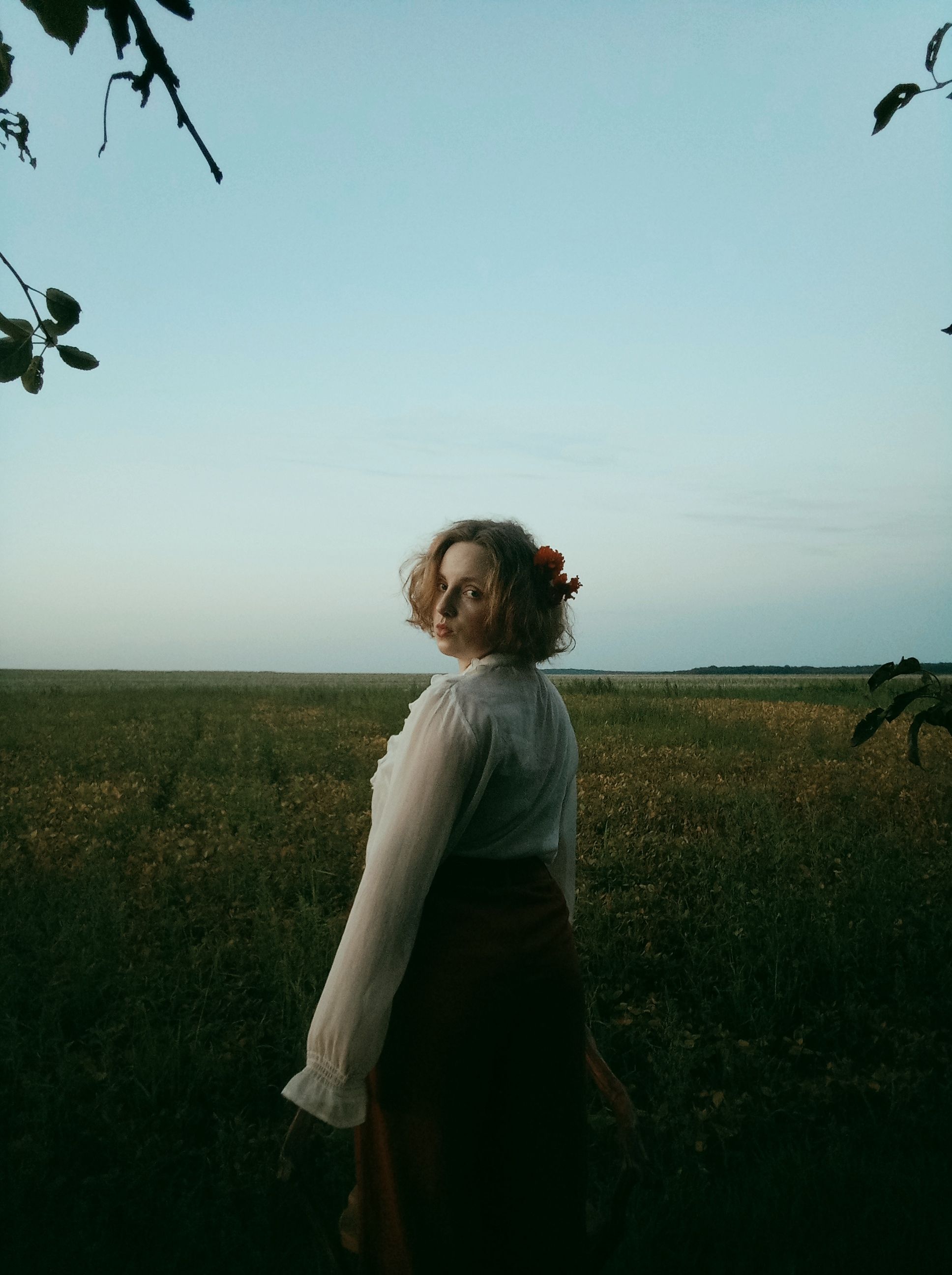 Woman Wearing White Long Sleeves while Standing on Grass Field · Free ...