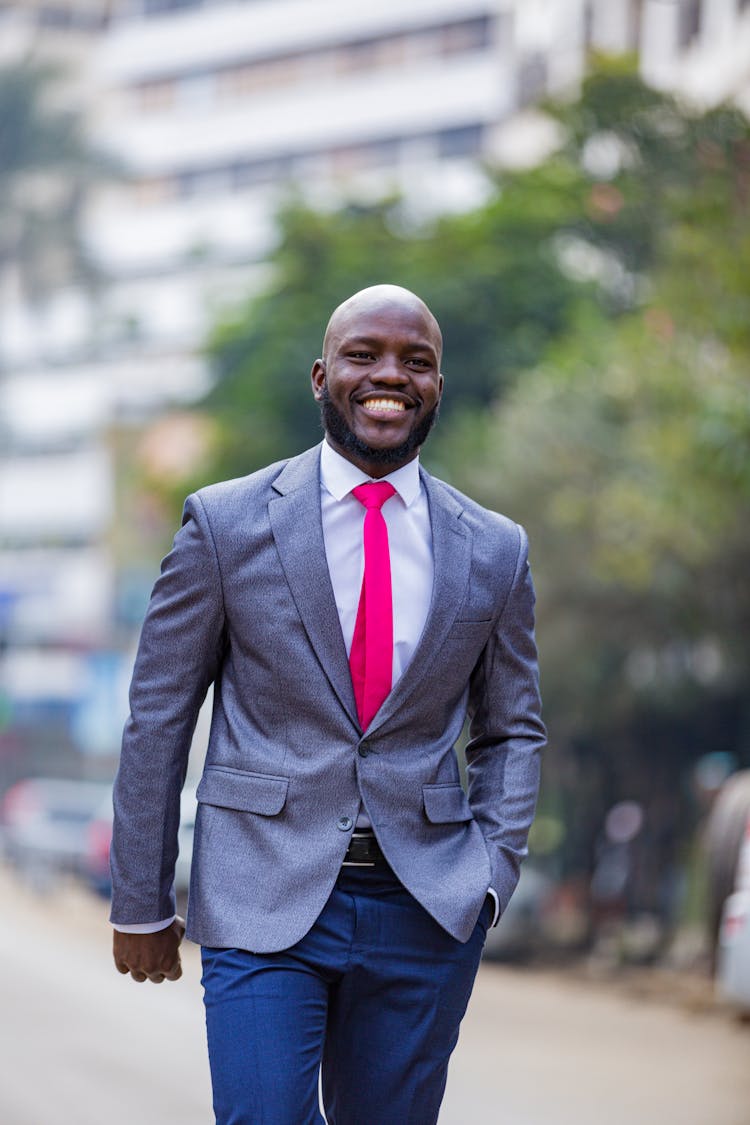 A Happy Man In A Grey Suit