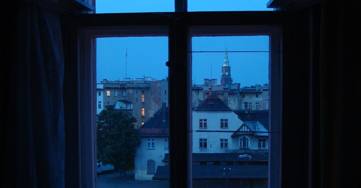 Window Overlooking Night White Wooden Framed Glass Window Overlooking City Buildings · Free ...