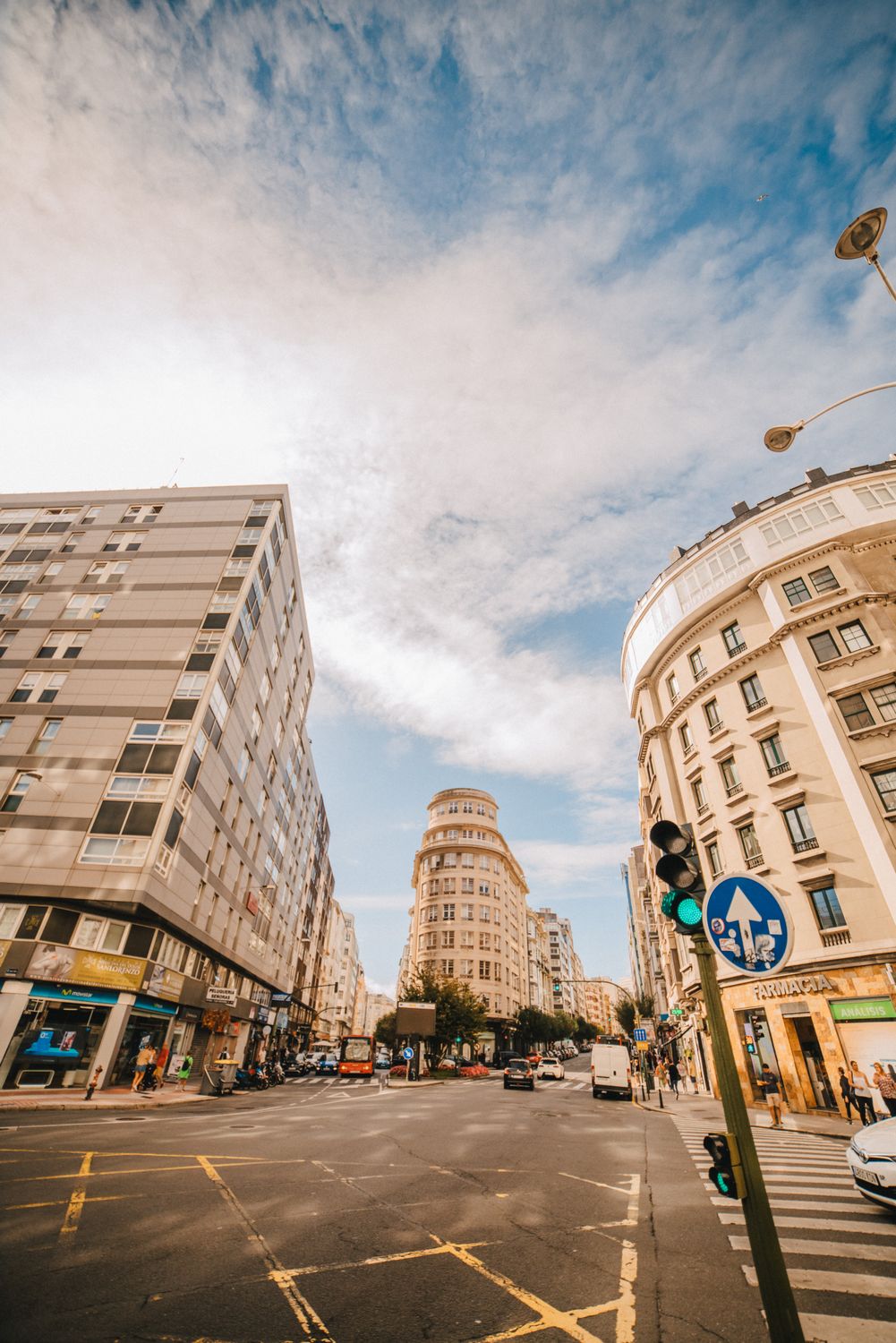 City Buildings Between Road Intersection · Free Stock Photo