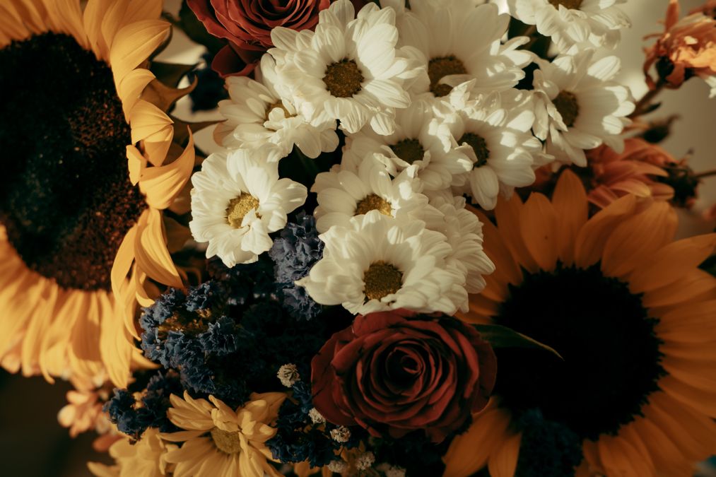 Bright bouquet of sunflowers and daisies for a friend