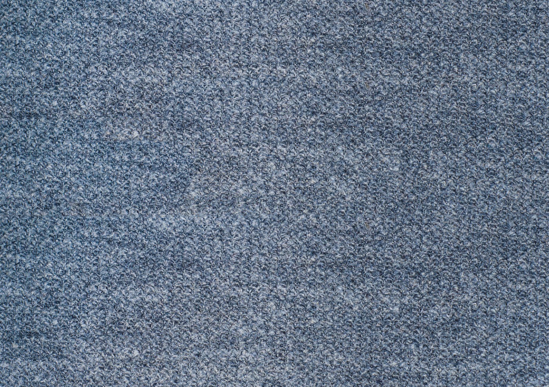 Close-up of fine merino wool knit fabric texture used in lightweight base layers