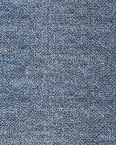 Detailed close-up of a textured blue fabric surface, perfect for backgrounds.