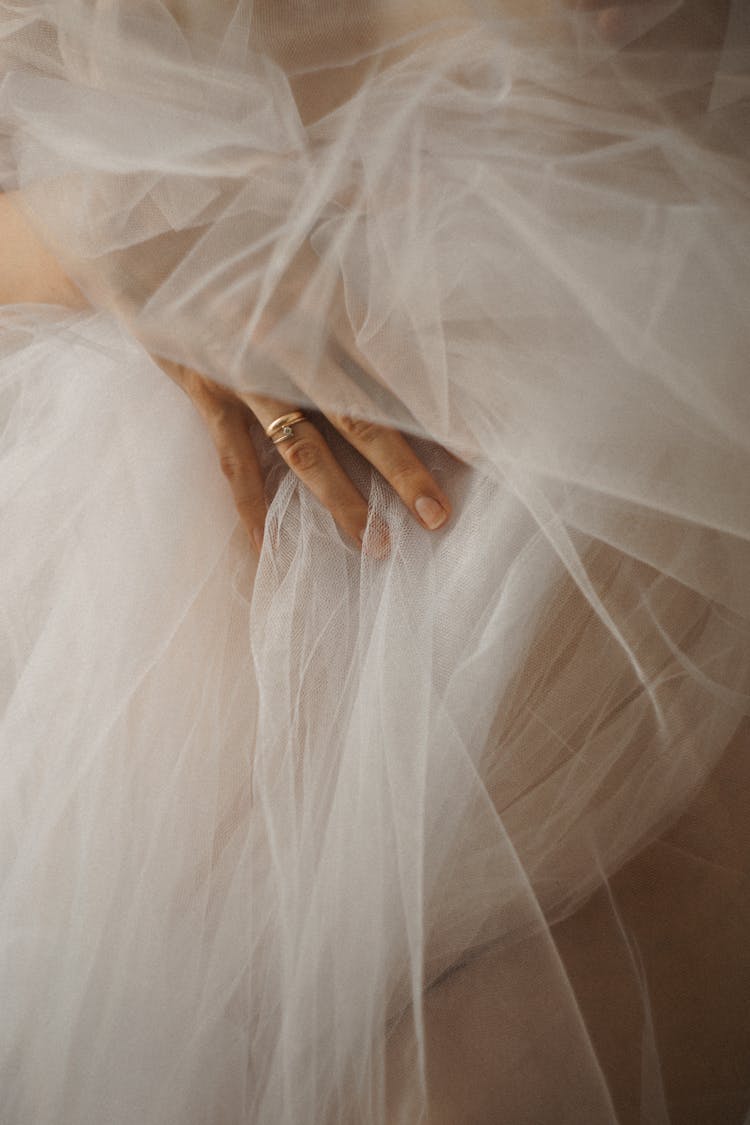 Close-up Of Woman Hand In Tulle