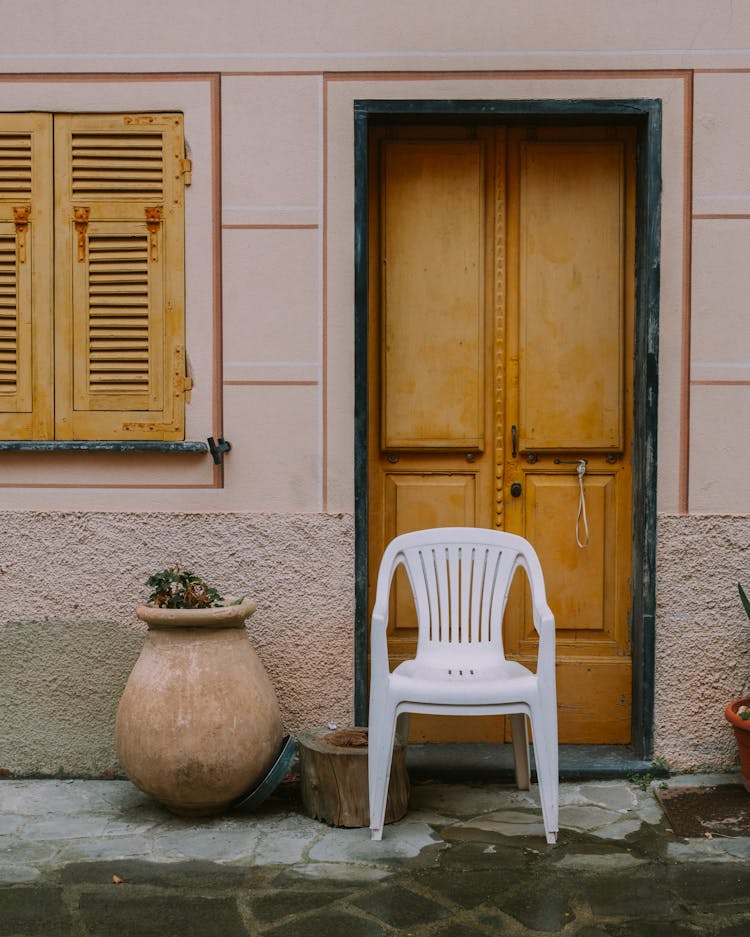 Plastic Chairs At Doorstep