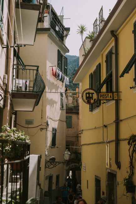 Explore the quaint narrow streets and colorful architecture of Monterosso al Mare, Liguria, Italy.