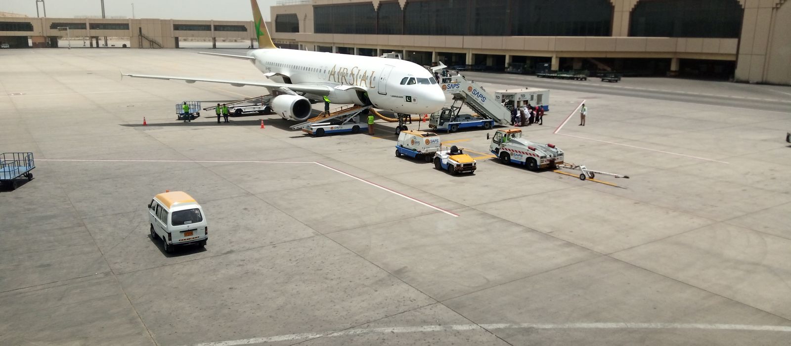 Airline jet preparing for takeoff on a sunny day at Karachi Airport. — flights from Multan to Karachi