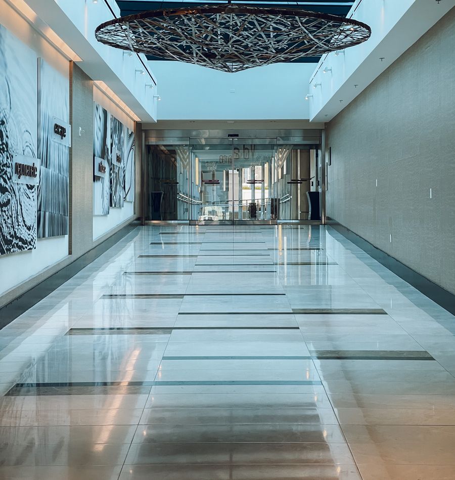 Polished commercial flooring in a bright Cincinnati-area office corridor