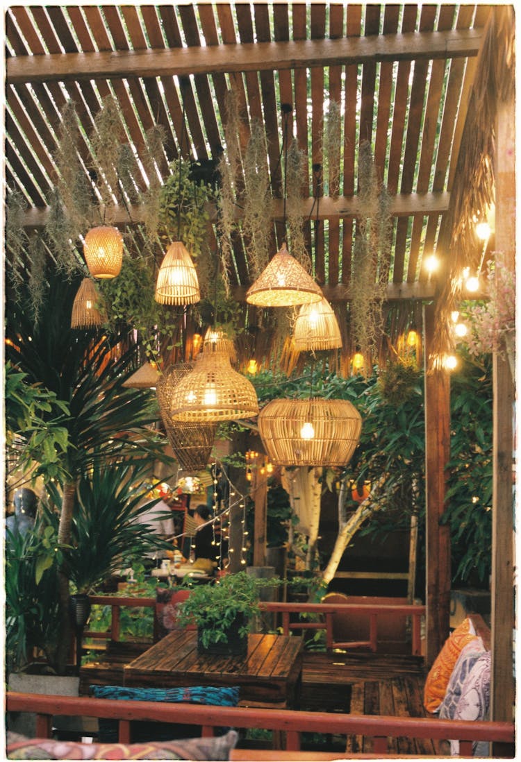 Lanterns And Lights In Bar With Rustic Design