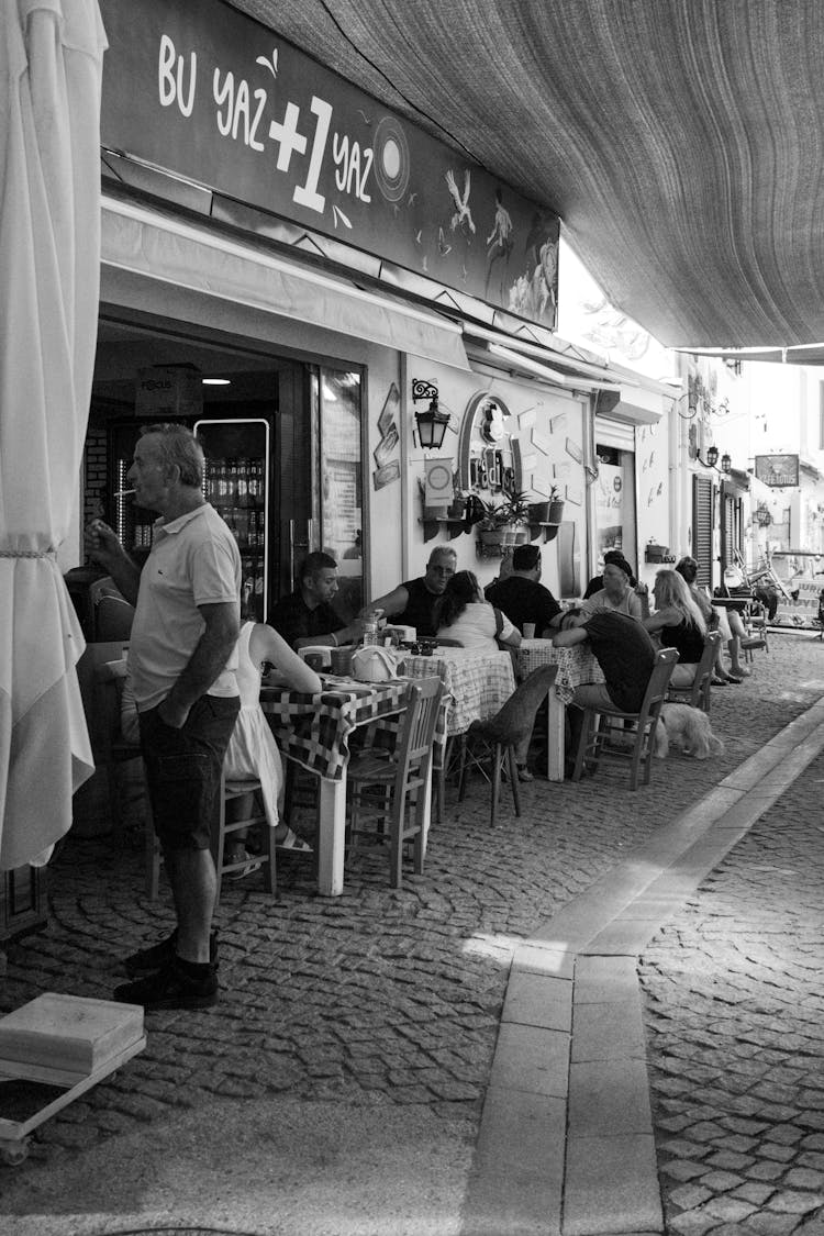 People Eating In The Restaurant