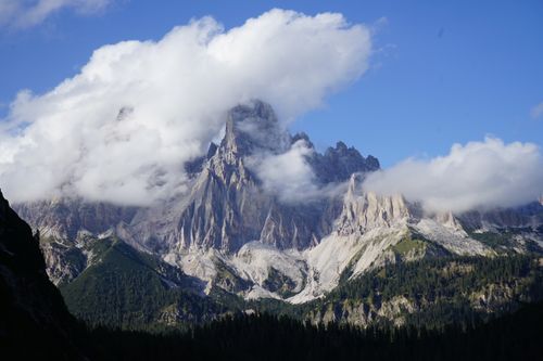 Free Scenic view of the Dolomites with rocky peaks and clouds in Italy. Stock Photo