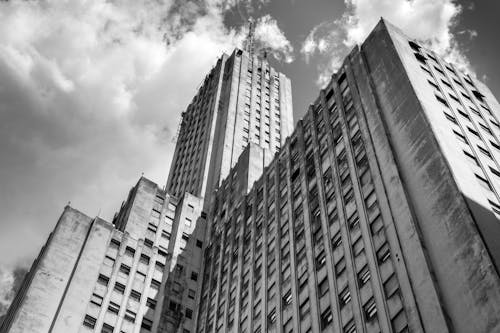 Grayscale Photo of a High-rise Building