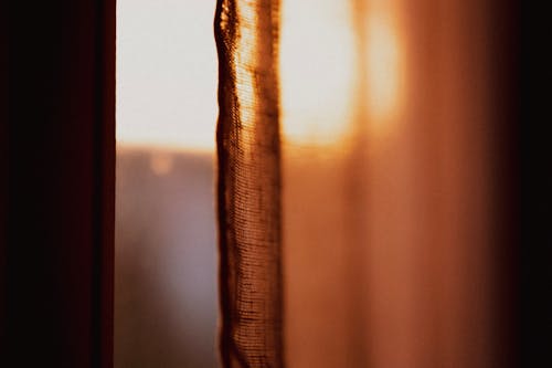Curtain and Window at Dusk