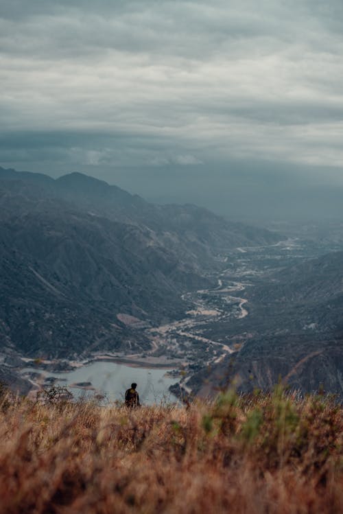 Stream in a Mountain Valley Covered with Fog