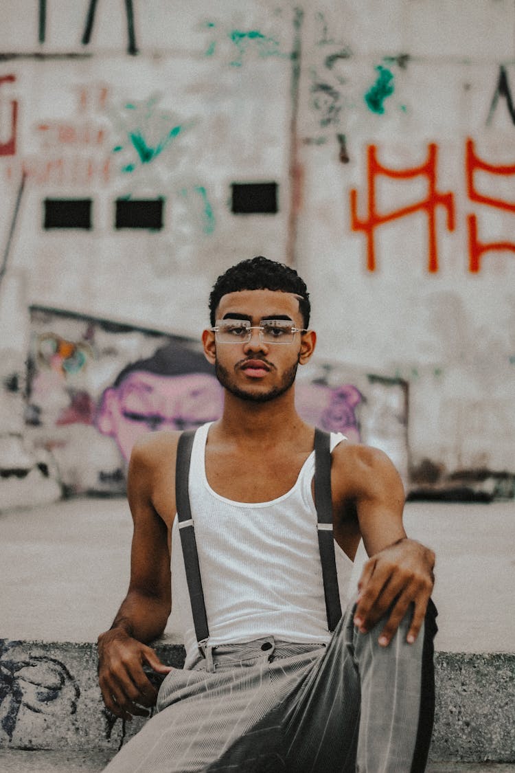 Man Wearing Suspenders On Tank Top