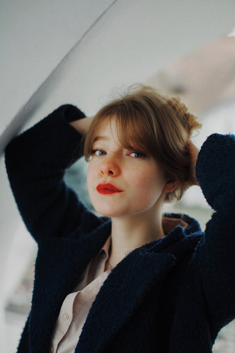 Portrait Of Young Woman With Red Lipstick