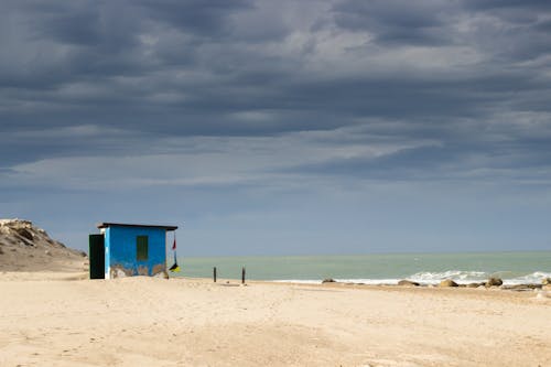 Clouds Above Sea and Beach with Booth