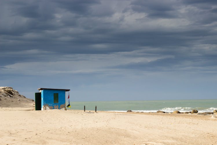 Clouds Above Sea And Beach With Booth