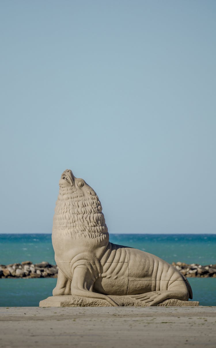 Concrete Sea Lion Statue Near A Beach