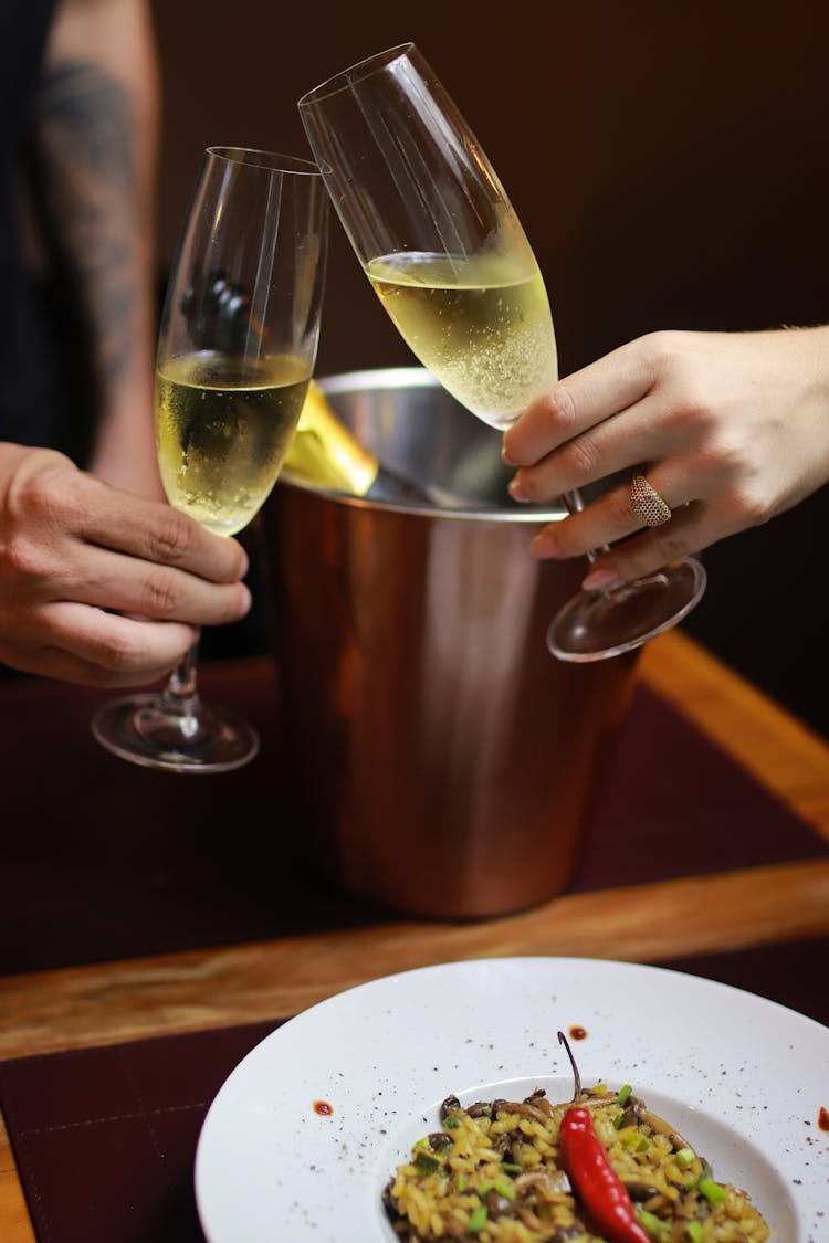 Couple Toasting Champagne Glasses