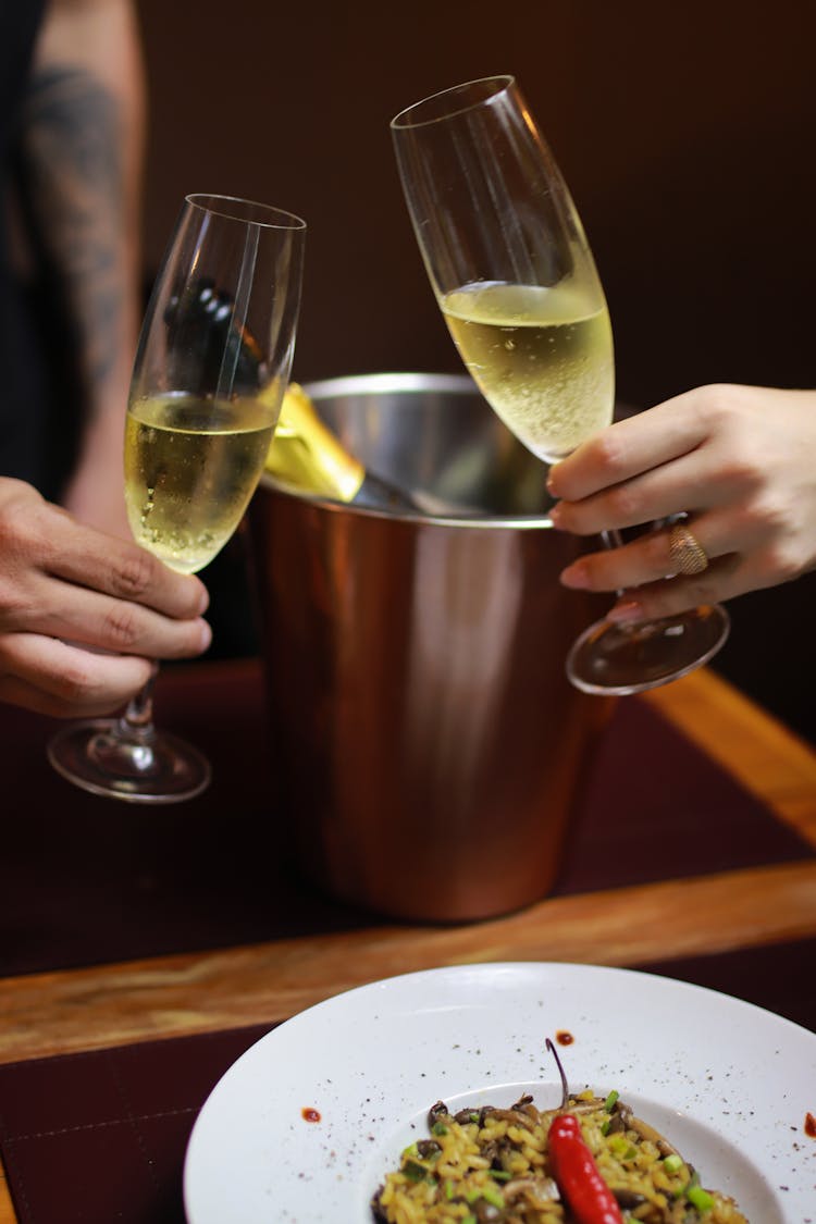 Couple Toasting Champagne Glasses