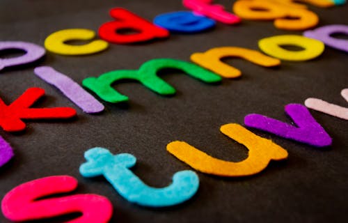 Closeup Photo of Assorted-color Alphabets