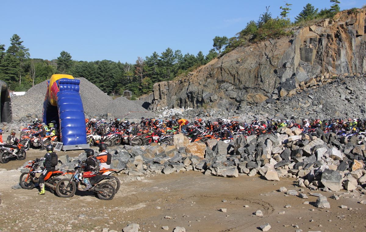 Enduro rider crossing a rocky stage, by Rally Connex on Pexels