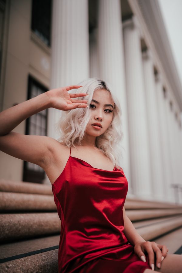 Woman in satin skirt with slit