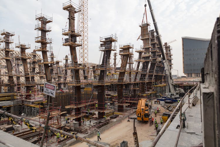 Busy Workers In Construction Site