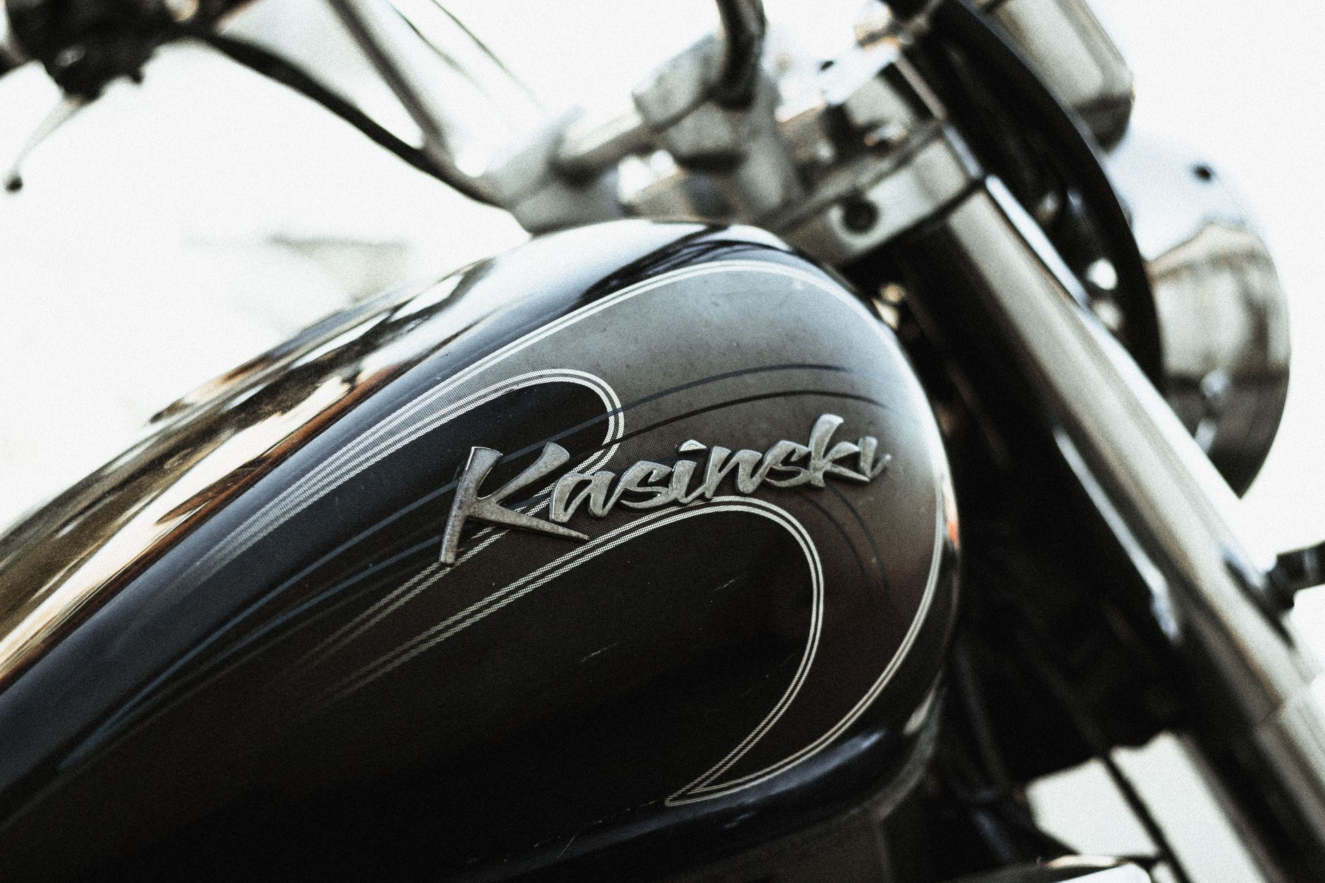 Detailed shot of a motorcycle fuel tank featuring the Kasinski emblem in Aracati, Brazil.