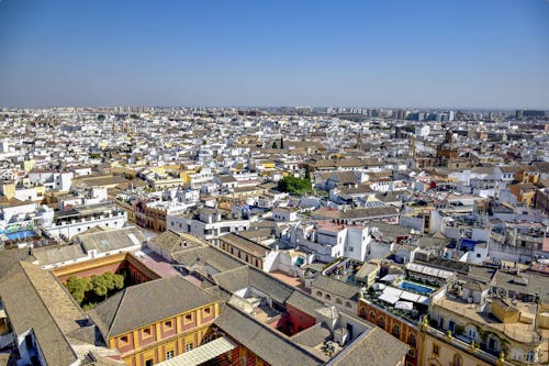 Aerial View of City Buildings Under Blue Sky