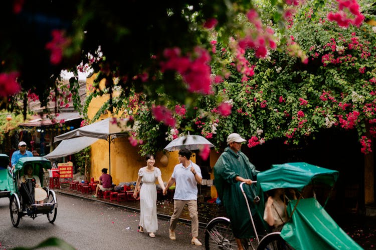 Smiling People On Street In Spring