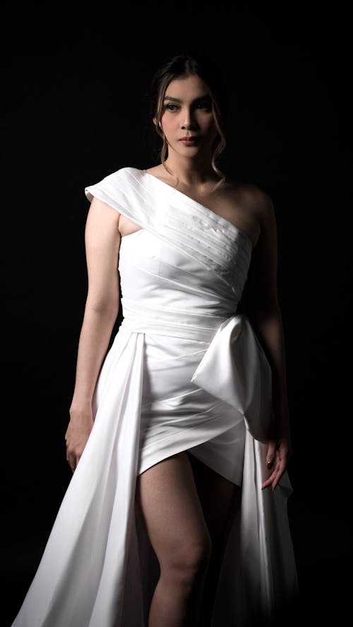 Studio Shot of Model in White Dress