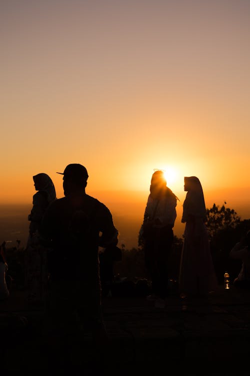 Four People on Top of Mountain