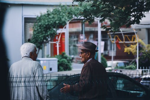 Elderly Men Talking in Town