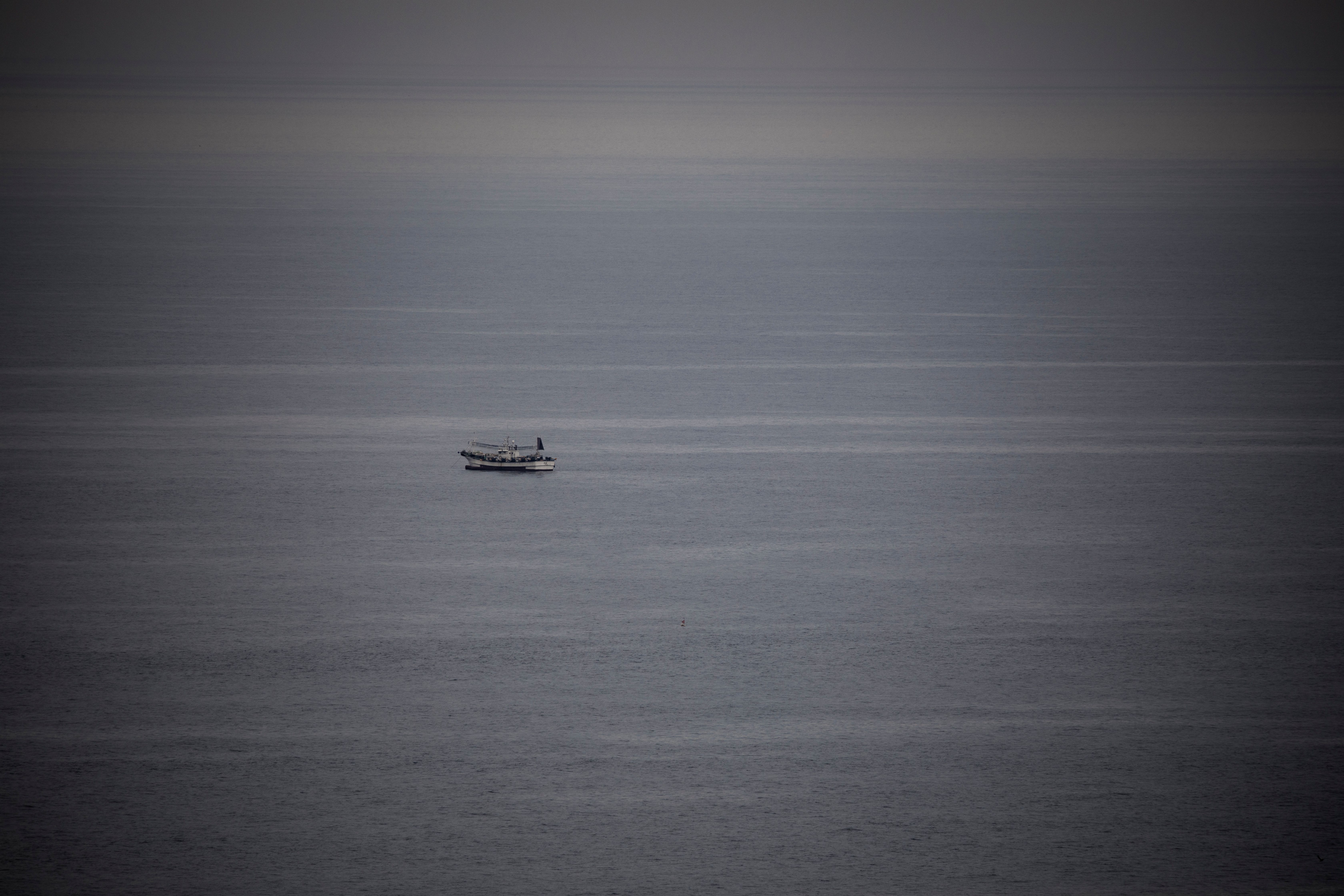 Aerial Photography of a Boat on the Ocean · Free Stock Photo