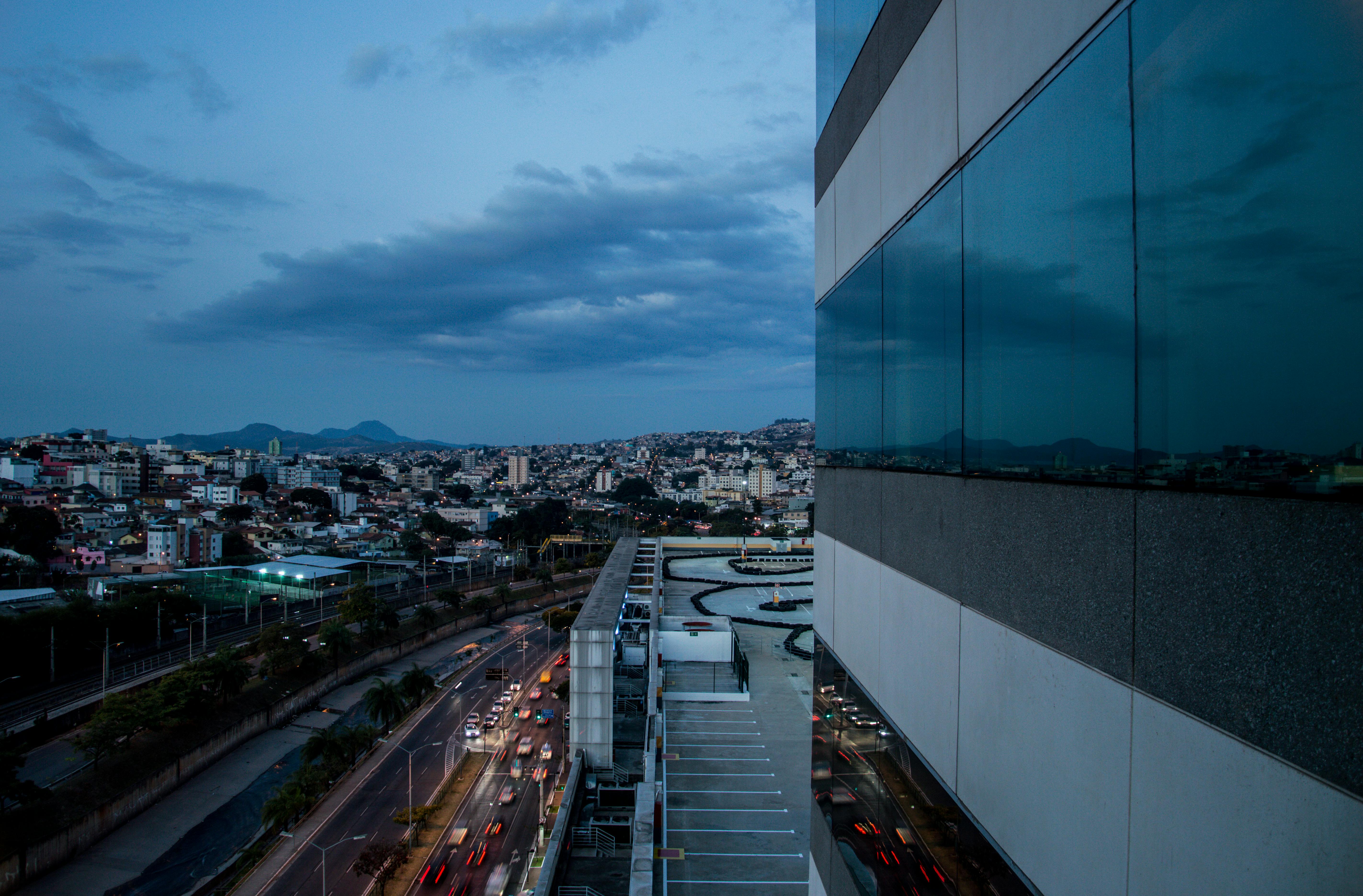 Grey And White Building Overlooking City Skyline Free Stock Photo Grey And White Building Overlooking City Skyline Free Stock Photo