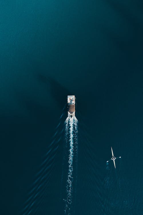 Drone Shot of a Boat Sailing in Sea 