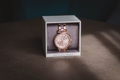 Free Round Gold-colored Analog Watch With Link Bracelet and Box Stock Photo
