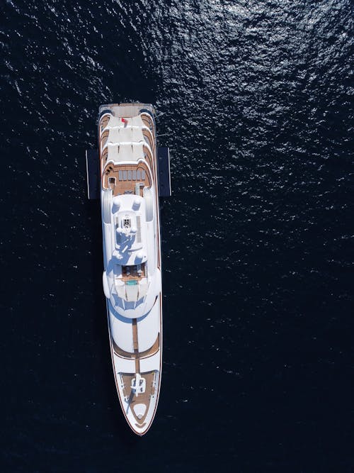 Aerial Photography of a White Yacht on the Ocean