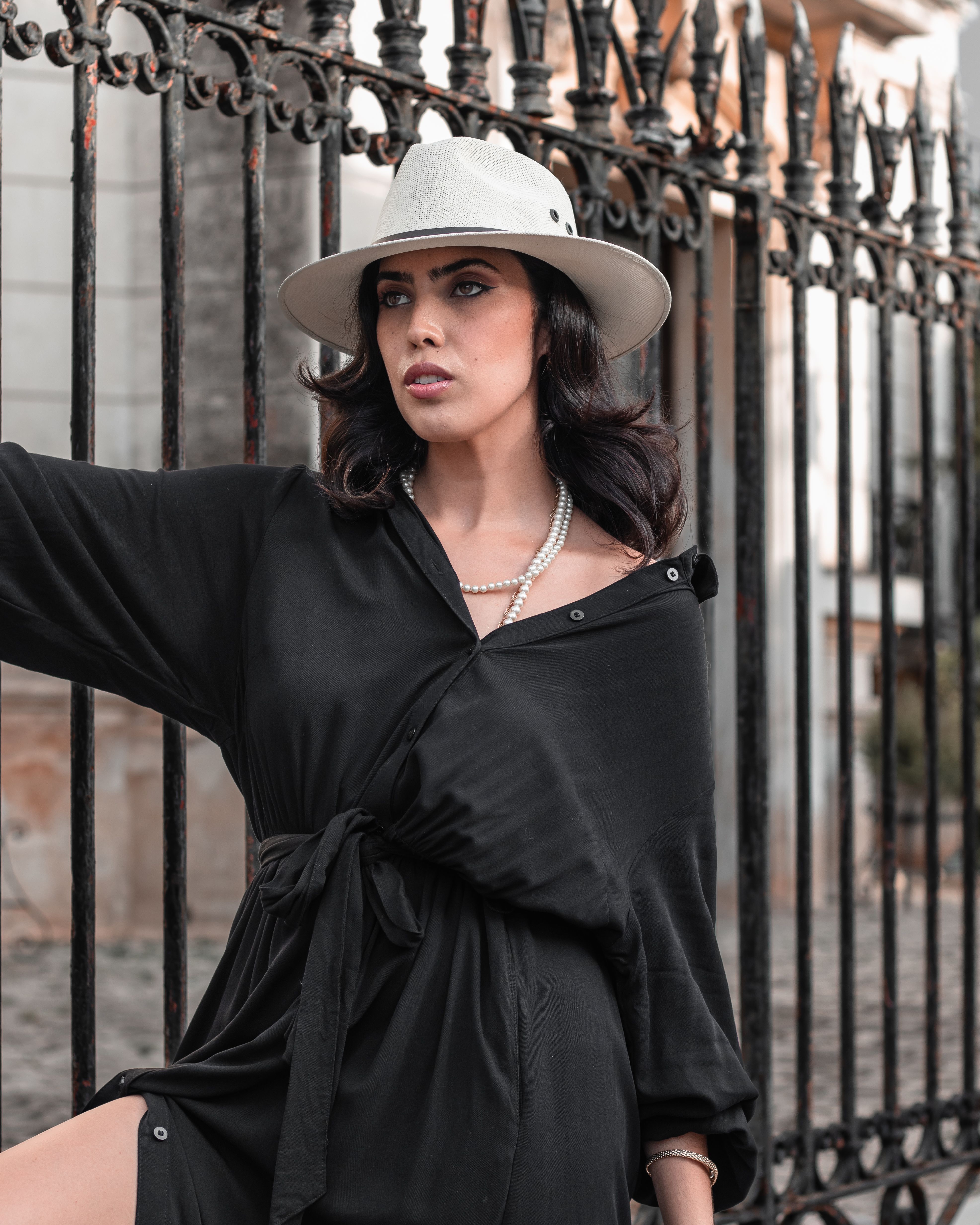A Woman in a Black Dress Wearing a Hat · Free Stock Photo