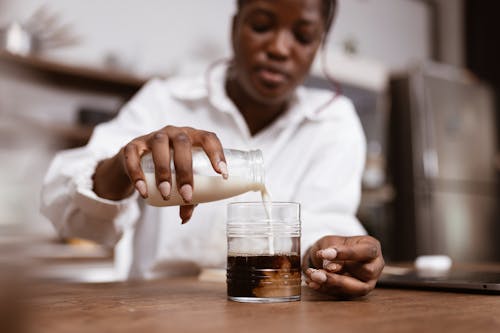 Woman Making Ice Coffee