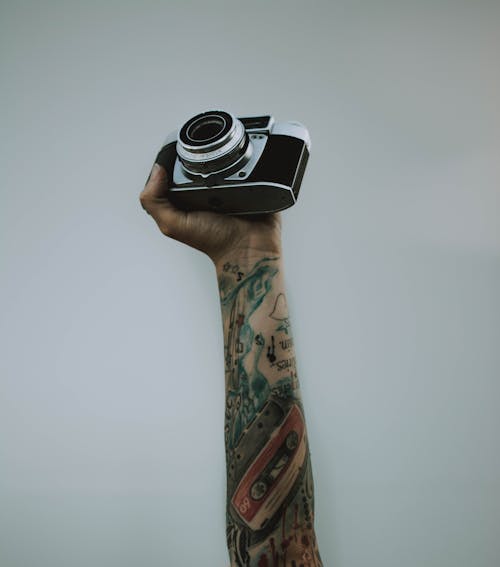 Free Person Holding Slr Camera Stock Photo