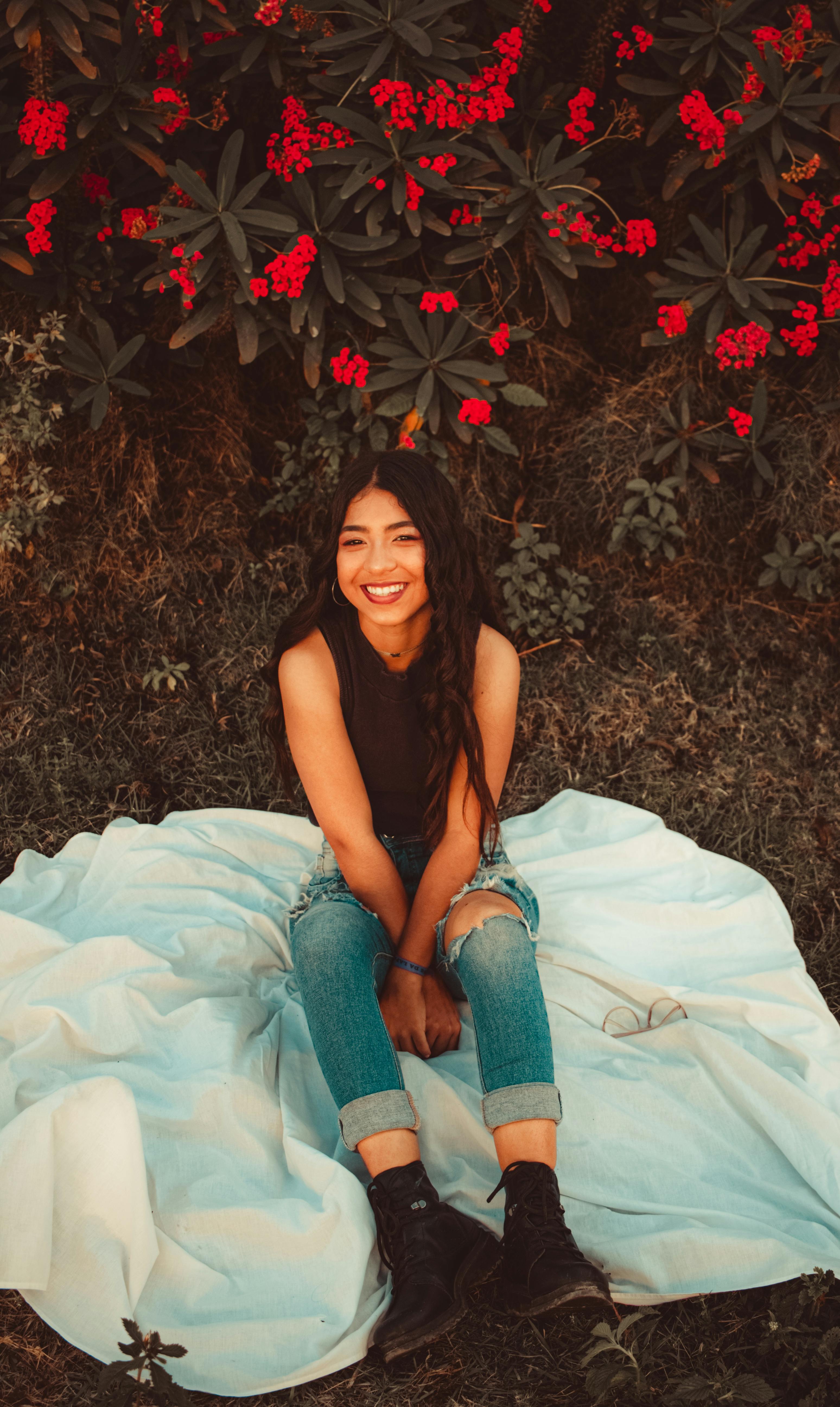 Woman in Black Tank Top and Blue Denim Jeans · Free Stock Photo