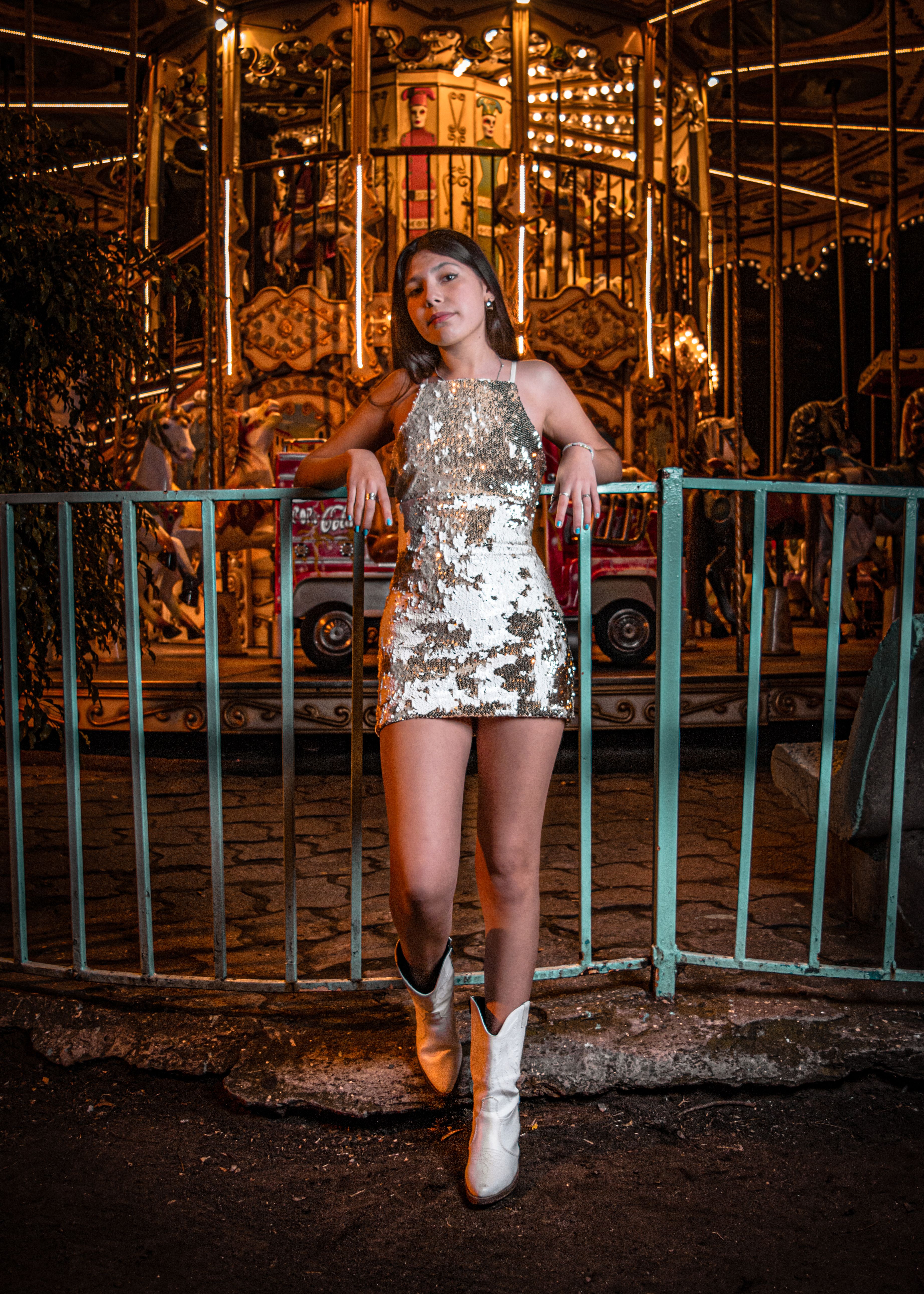 Woman in Sleeveless Dress Leaning on Metal Railing · Free Stock Photo