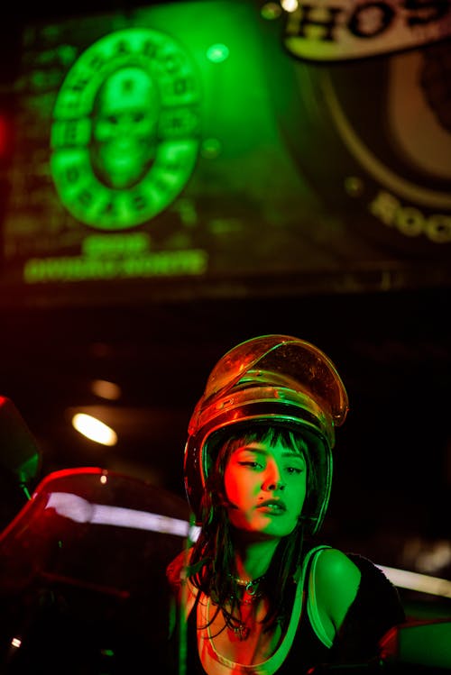 Woman Wearing Protective Helmet in Bar
