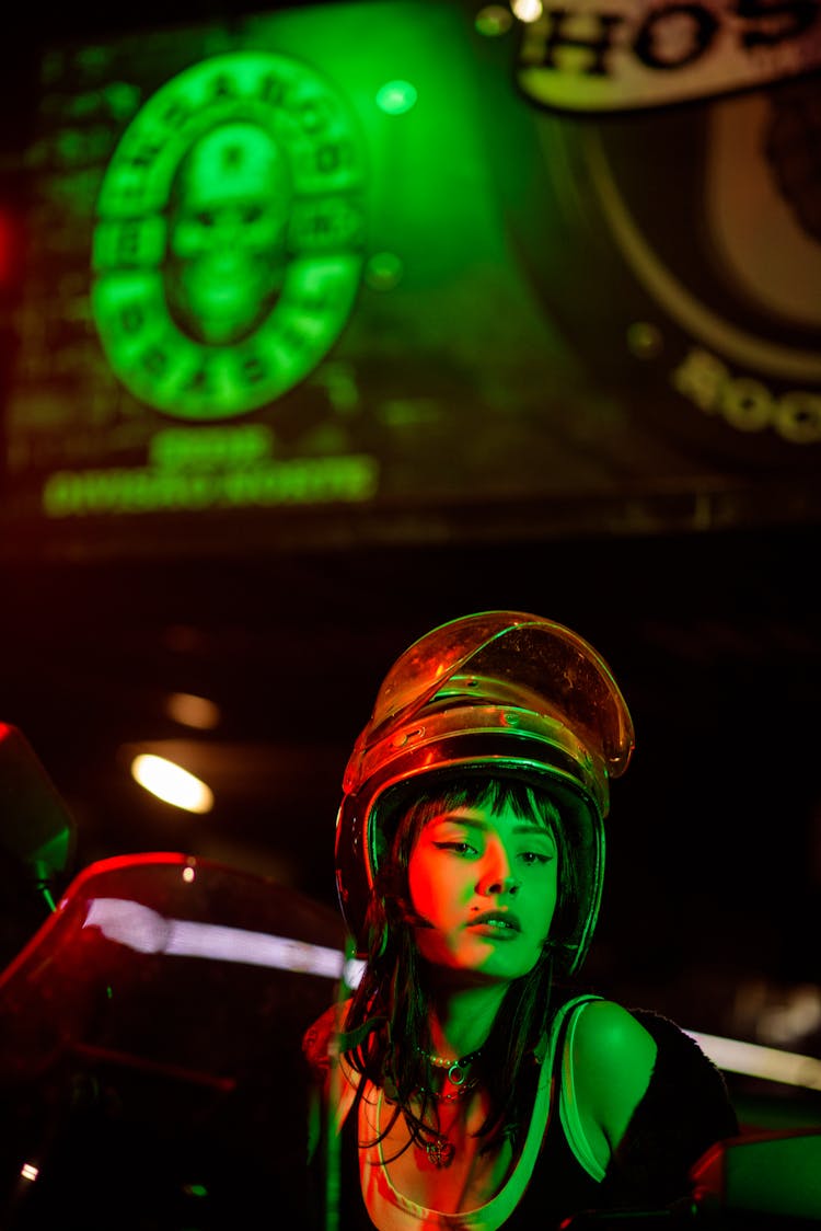 Woman Wearing Protective Helmet In Bar