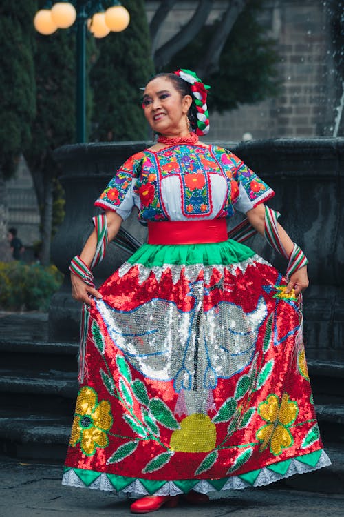 Woman in Traditional Clothes Posing